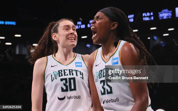 Breanna Stewart and Jonquel Jones of the New York Liberty celebrate a block against the Washington Mystics during Game Two of Round One of the 2023...