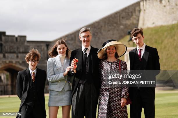 Jacob Rees-Mogg, Britain's former business secretary and MP for North East Somerset, poses with his wife Helen de Chair and children Thomas, Mary and...