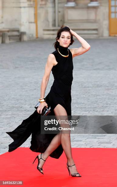 French actress Charlotte Gainsbourg arrives at the Chateau de Versailles for a state dinner with French President Emmanuel Macron, Brigitte Macron,...