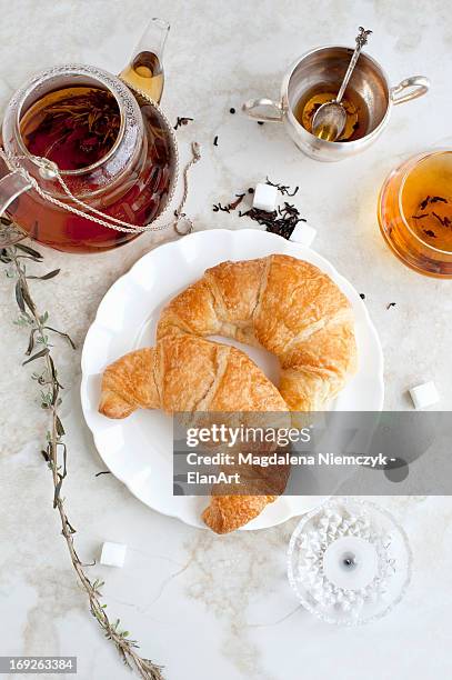croissants, honey and tea on table - sugar cubes in tea stock pictures, royalty-free photos & images