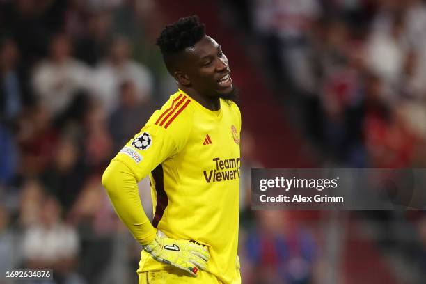 Andre Onana of Manchester United reacts during the UEFA Champions League match between FC Bayern München and Manchester United at Allianz Arena on...