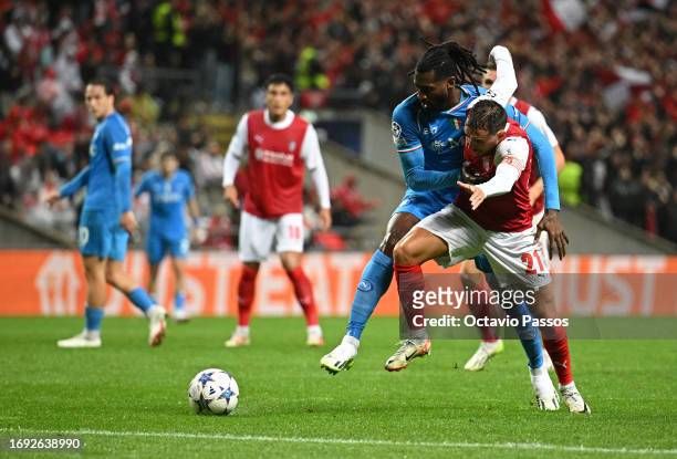 Ricardo Horta of SC Braga is challenged by Andre-Frank Zambo Anguissa of Napoli during the UEFA Champions League match between SC Braga and SSC...