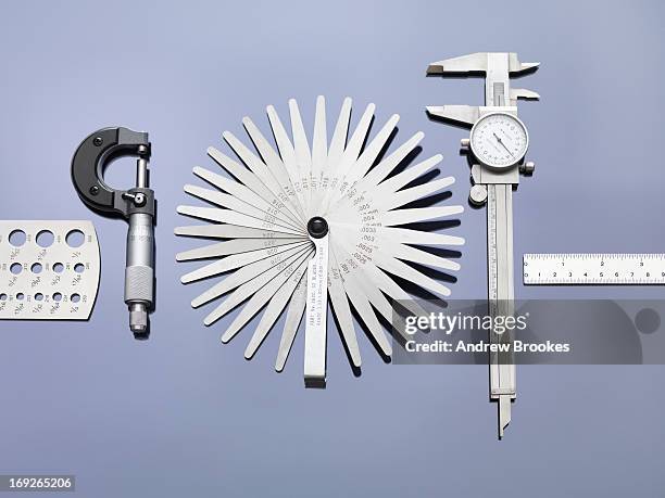 engineering measurement tools used in industry - calibrador fotografías e imágenes de stock