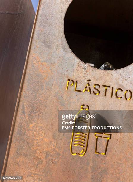 recycling container made of metal for plastic. - color coded stock pictures, royalty-free photos & images