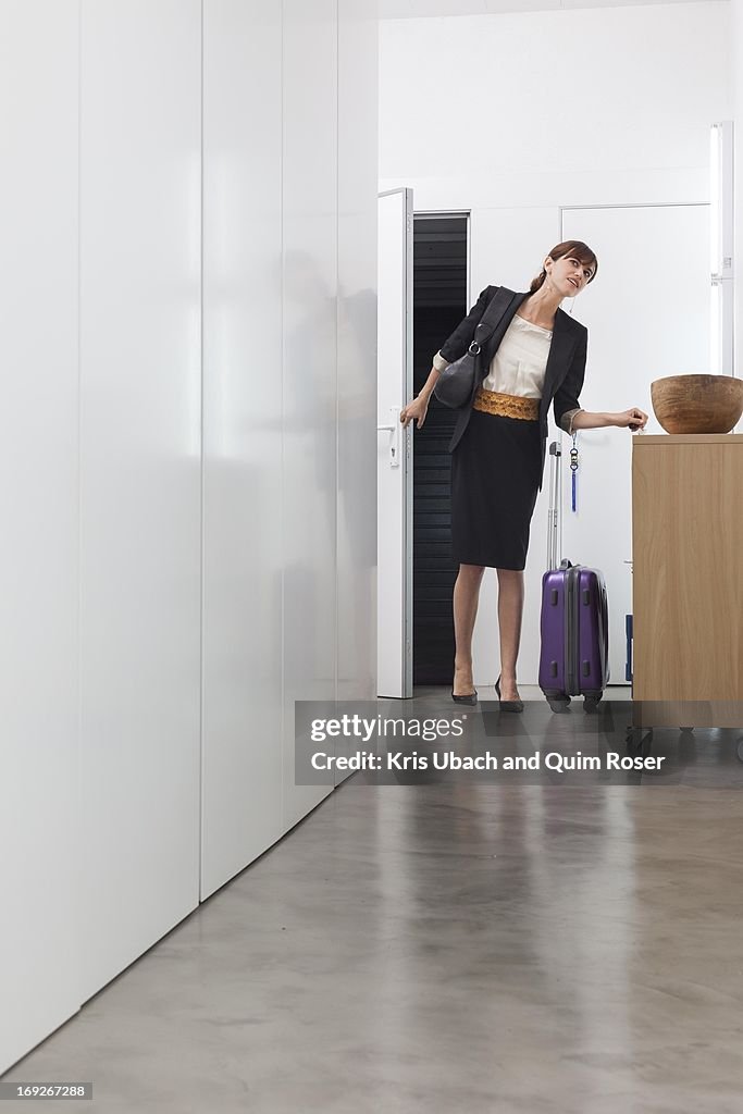 Woman returning from business trip