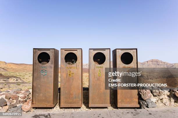 recycling containers made of metal for plastic, paper, glass and biodegradable organics. - color coded stock pictures, royalty-free photos & images