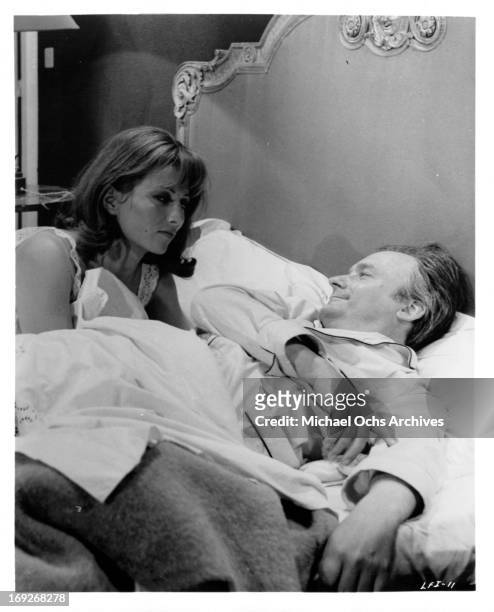 Stephane Audran in bed with Michel Bouquet in a scene from the film 'The Unfaithful Wife', 1969.