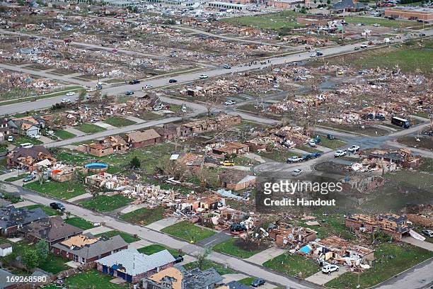 In this handout from the Oklahoma National Guard, an aerial view of destroyed houses and buildings after a powerful tornado ripped through the area...