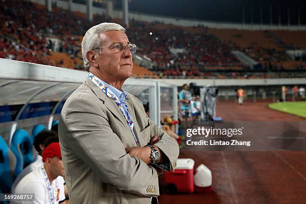 Marcello Romeo Lippi, Team Coach of Guangzhou Evergrande looks on during the AFC Champions League knockout round match between Guangzhou Evergrande...