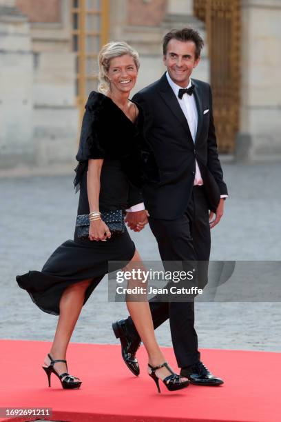 Chloe Bollore and Yannick Bollore arrive ahead of a state dinner at the Chateau de Versailles on September 20, 2023 in Versailles, France. The King...