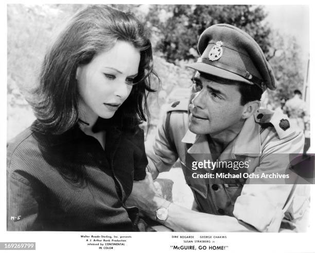 Susan Strasberg is grabbed by man in uniform in a scene from the film 'McGuire, Go Home!', 1964.