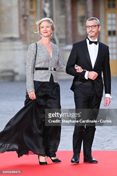 Sylvie Schirm and Alexis Kohler arrive at the Palace of Versailles ahead of the State Dinner held in honor of King Charles III and Queen Camilla in...