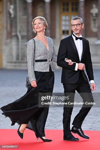 Sylvie Schirm and Alexis Kohler arrive at the Palace of Versailles ahead of the State Dinner held in honor of King Charles III and Queen Camilla in...