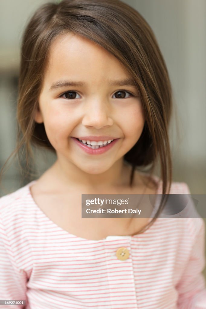 Close up of girlís smiling face