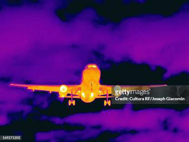 thermal image of airplane landing - thermal imaging stock pictures, royalty-free photos & images