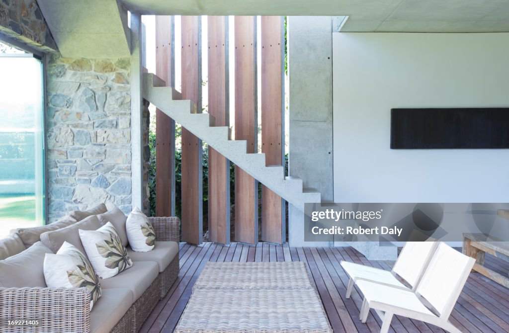 Sofa, chairs and table in modern living room