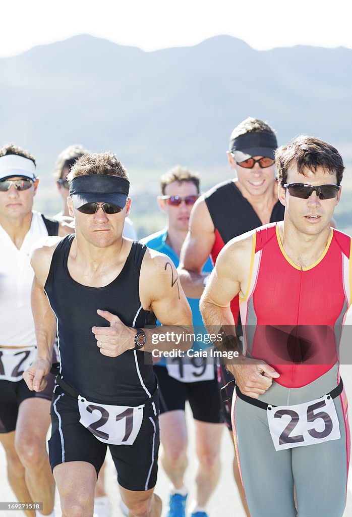 Runners in race on rural road