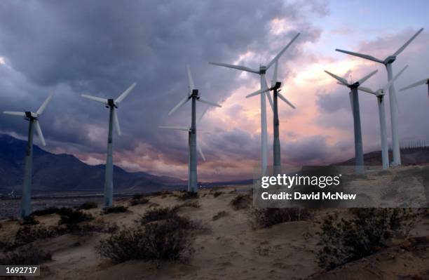 An El Nino-influenced storm breaks up over giant windmills on December 17, 2002 near Palm Springs, California. Because of consistantly high winds,...