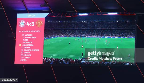 The scoreboard shows the final score after the UEFA Champions League match between FC Bayern München and Manchester United at Allianz Arena on...