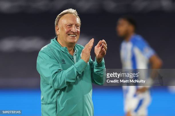 Neil Warnock, Manager of Huddersfield Town, acknowledges the fans after the Sky Bet Championship match between Huddersfield Town and Stoke City at...