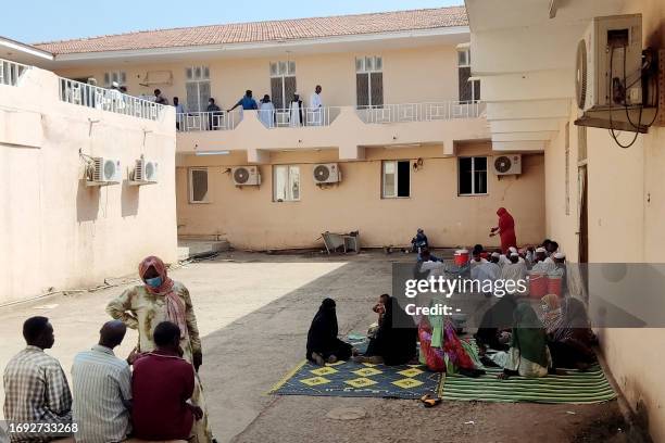 Patients gather at a hospital amid the spread of cholera and dengue fever cases, in Gedaref city on September 27, 2023.