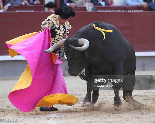 Spanish matador Ivan Fandino makes a pass to a bull at Las Ventas bullring during the San Isidro Feria on May 22, 2013 in Madrid. AFP PHOTO / ALBERTO...
