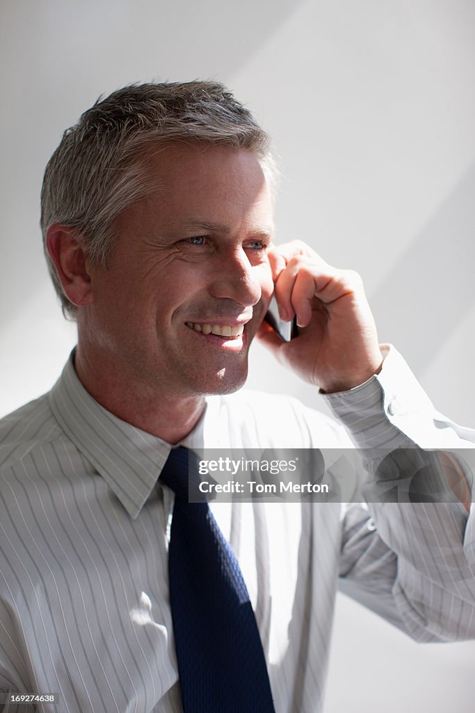 Businessman talking on cell phone