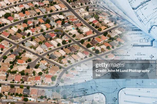 aerial montage of suburbs with blueprints - housing development plans stock pictures, royalty-free photos & images