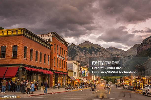 telluride main street under cloudy sky - film festival stock pictures, royalty-free photos & images