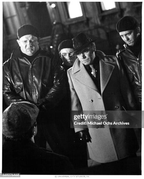 Terry Funk, Frank Pesce, Kevin Conway, and Paul Mace gather in a scene from the film 'Paradise Alley', 1978.