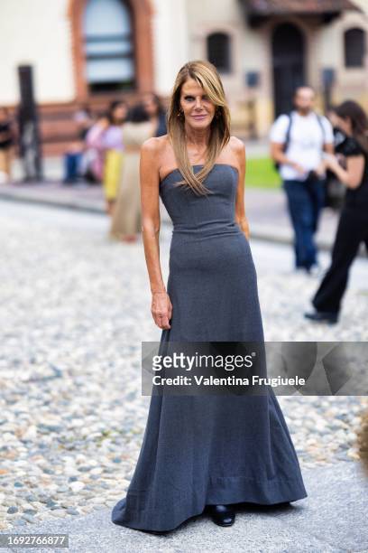 Anna Dello Russo is seen wearing a navy dress outside the Alberta Ferretti show during Milan Fashion Week Womenswear Spring/Summer 2024 on September...