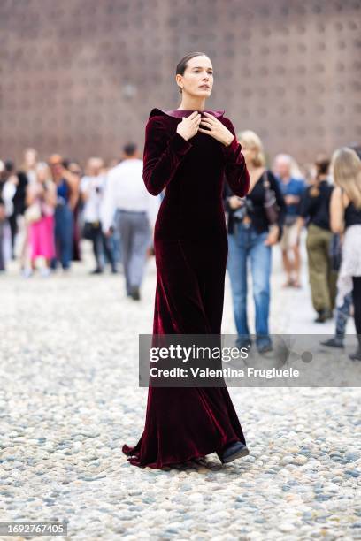 Chiara Baschetti is seen wearing a burgundy velvet long dress outside the Alberta Ferretti show during Milan Fashion Week Womenswear Spring/Summer...