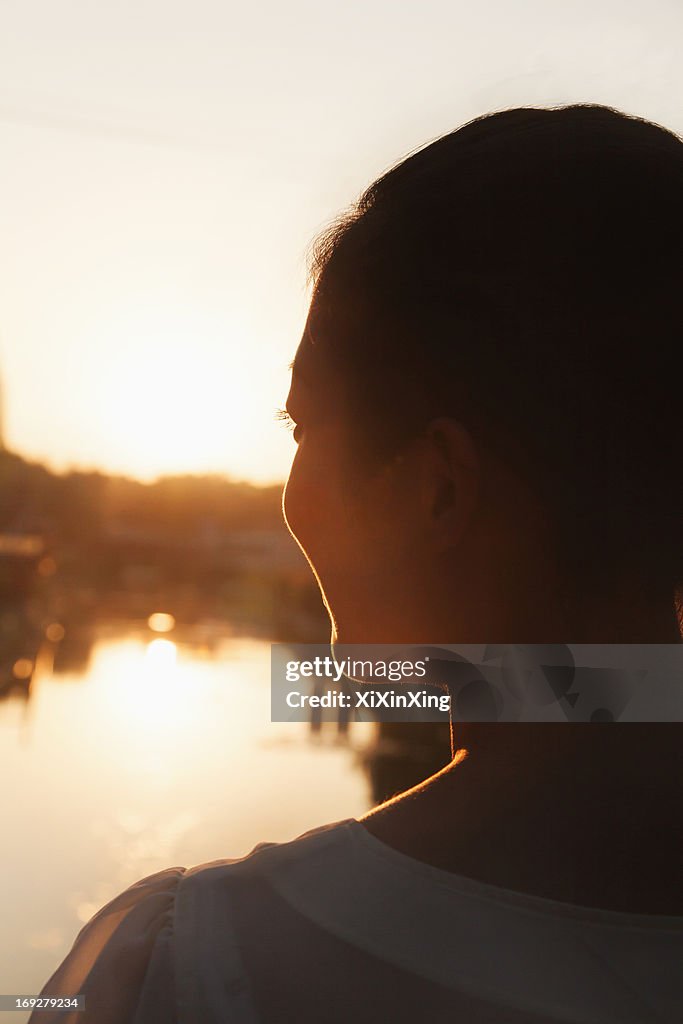 Silhouette of Woman's Face at Sunset