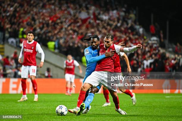 Ricardo Horta of SC Braga and Zambo Anguissa of SSC Napoli in action during the UEFA Champions League match between SC Braga and SSC Napoli at...