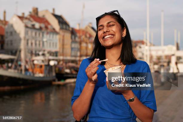 happy young woman with ice cream cup - olhos fechados imagens e fotografias de stock
