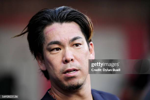 Kenta Maeda of the Minnesota Twins walks through the dugout before the game against the Cincinnati Reds at Great American Ball Park on September 19,...