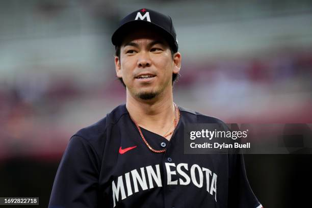 Kenta Maeda of the Minnesota Twins walks across the field in the second inning against the Cincinnati Reds at Great American Ball Park on September...