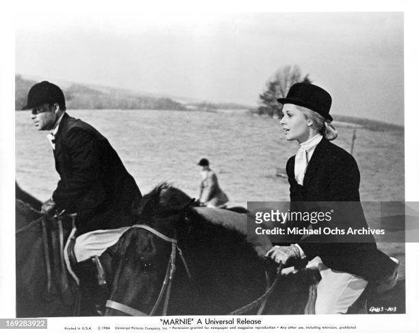 Tippi Hedren sets off on a fox hunt in a scene from the film 'Marnie', 1964.