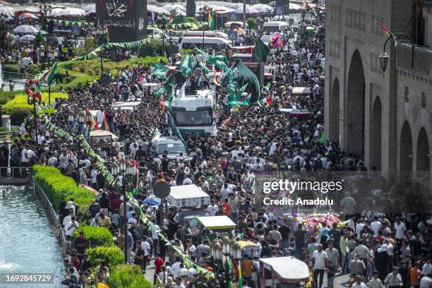 People gather at the Citadel of Erbil to celebrate the Mawlid al-Nabi in Erbil, Iraq on September 27, 2023.