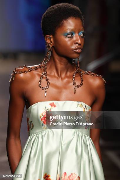 Model, beauty detail, walks the runway at the Antonio Marras fashion show during the Milan Fashion Week Womenswear Spring/Summer 2024 on September...
