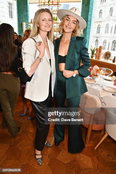 Candice Lake and Arizona Muse attend the launch of the Breitling Navitimer 32/36 Collection and 'For The Journey' campaign hosted by Breitling and...