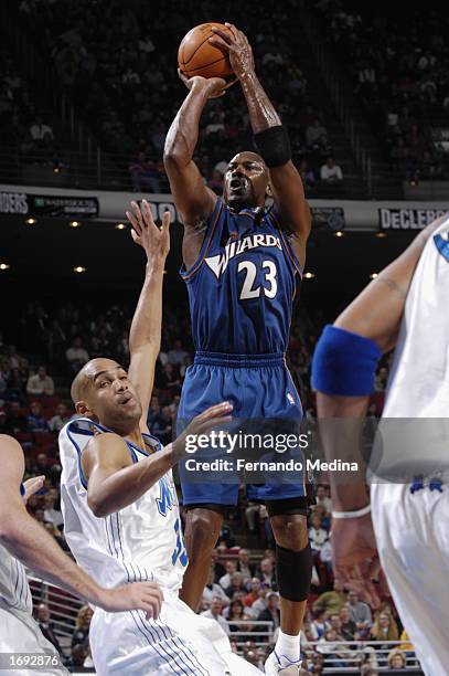 Michael Jordan of the Washington Wizards shoots a jump shot during the NBA game against the Orlando Magic at TD Waterhouse Centre on December 6, 2002...