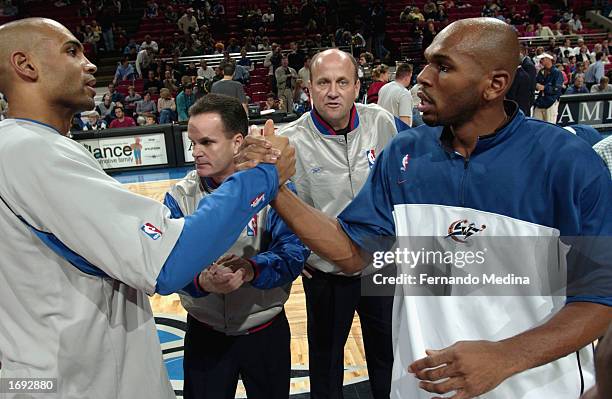 Grant Hill of the Orlando Magic and Jerry Stackhouse of the Washington Wizards greet each other prior to the start of the NBA game at TD Waterhouse...