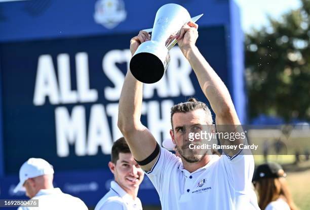 Rome , Italy - 27 September 2023; Former professional footballer Gareth Bale celebrates with the trophy after the All-Star Match before the 2023...