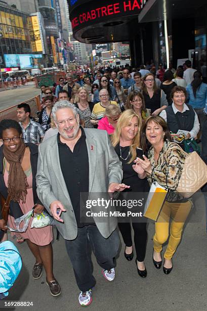 Harvey Fierstein leads the crowd to The Harvey Fierstein 15-Bite Brooklyn Diner "All Beef" Hot Dog Unveiling at Brooklyn Diner on May 22, 2013 in New...