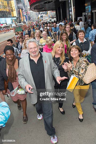 Harvey Fierstein leads the crowd to The Harvey Fierstein 15-Bite Brooklyn Diner "All Beef" Hot Dog Unveiling at Brooklyn Diner on May 22, 2013 in New...