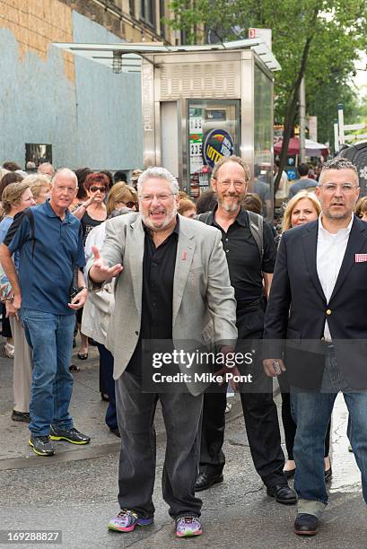 Harvey Fierstein leads the crowd to The Harvey Fierstein 15-Bite Brooklyn Diner "All Beef" Hot Dog Unveiling at Brooklyn Diner on May 22, 2013 in New...