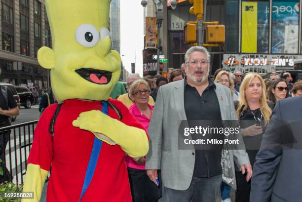 Harvey Fierstein leads the crowd to The Harvey Fierstein 15-Bite Brooklyn Diner "All Beef" Hot Dog Unveiling at Brooklyn Diner on May 22, 2013 in New...
