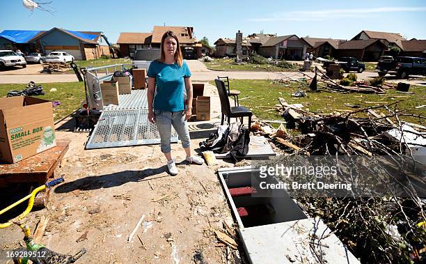 Jackie Watkins shows the storm shelter she and five members of her family survived the tornado May 22, 2013 in Moore, Oklahoma. The two-mile-wide...