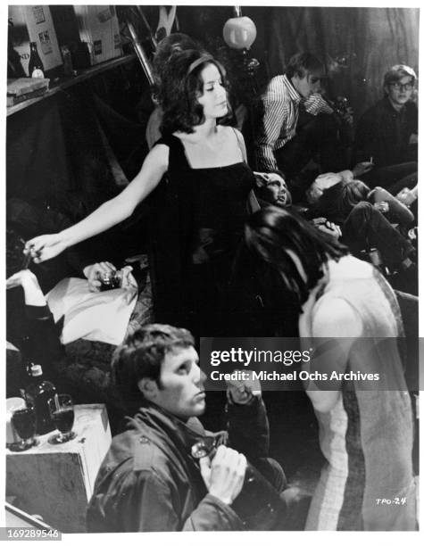 Louise Sorel at a party in a scene from the film 'The Party's Over', 1965. (Photo by Allied Artists/Getty Images